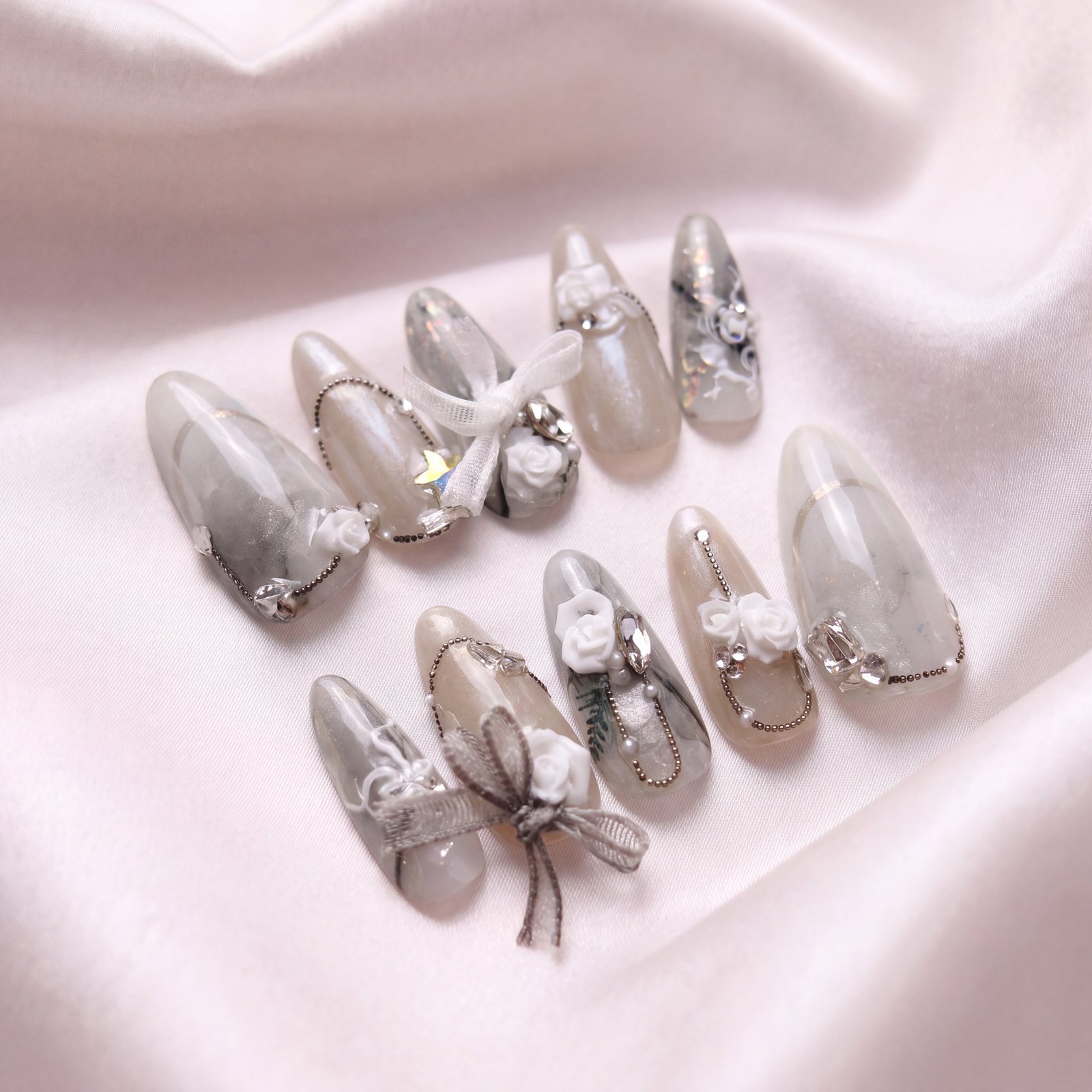 Bespoke set — smoky marble with white roses, ribbon bows and fine chain