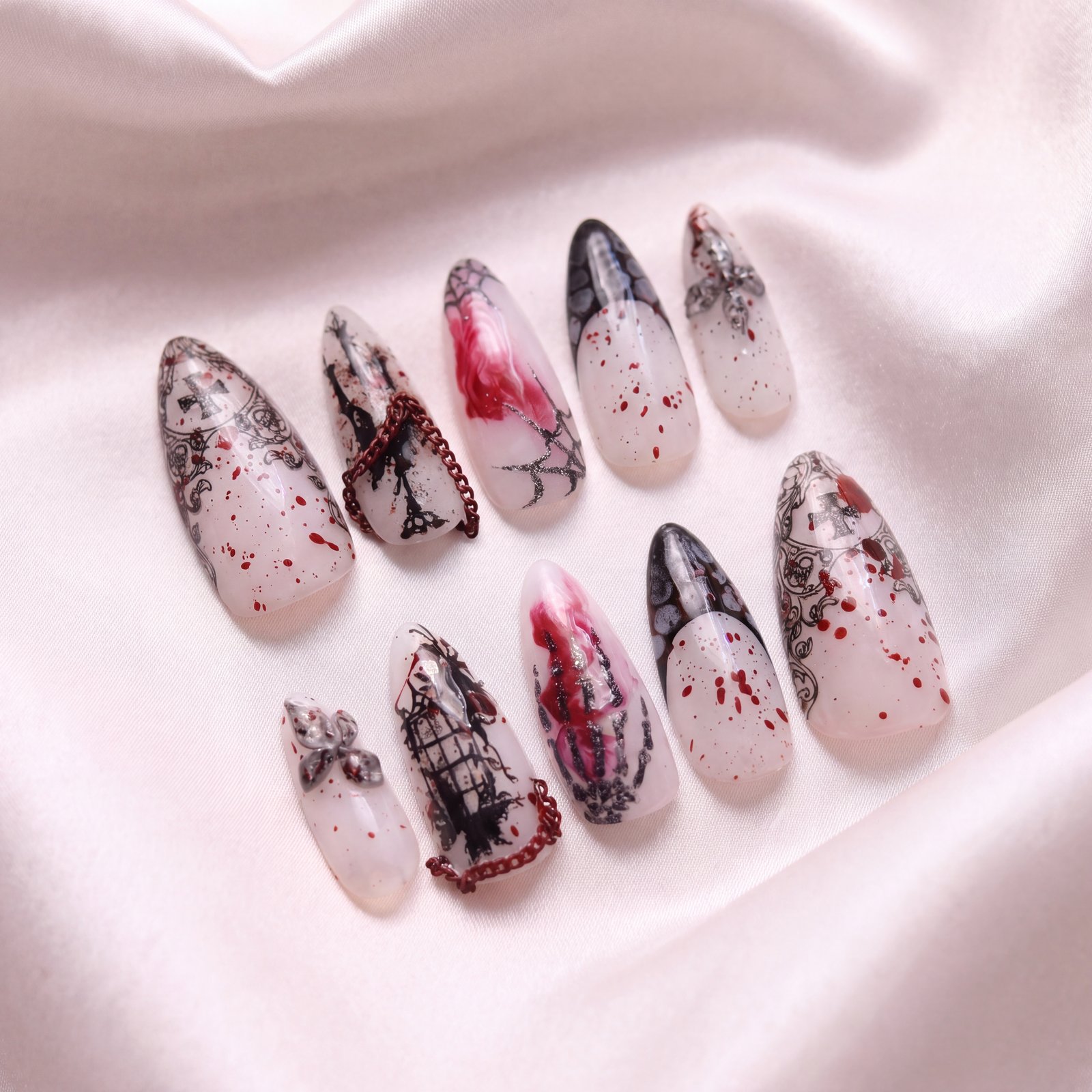 Bespoke set — gothic cathedral lines, a painted rose, red splatter and chain
